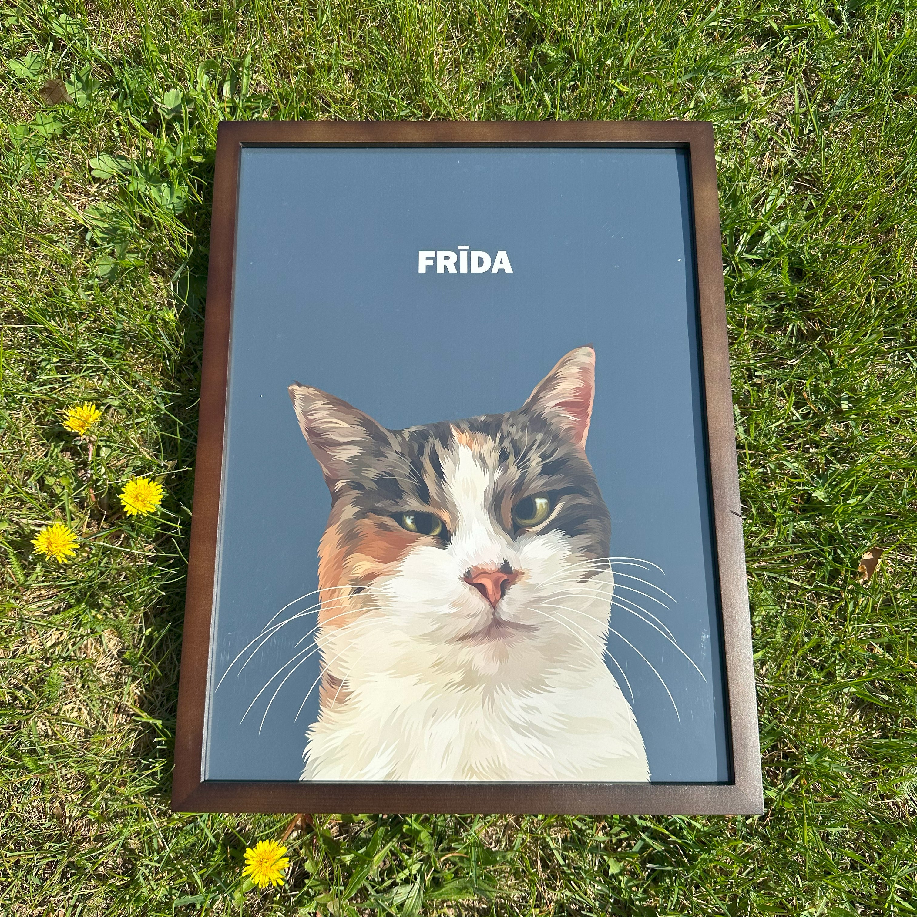Close up photo of 30x40cm custom pet portrait framed poster with cat's artwork on it