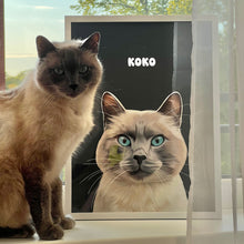 Load image into Gallery viewer, Photo of custom pet portrait framed poster with white-grey cat&#39;s artwork on it sitting next to the actual cat
